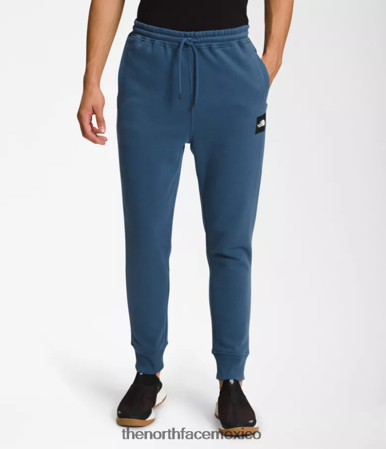 The North Face ropa NFHLJL1039 azul sombreado/negro tnf hombres joggers box nse - Image 1